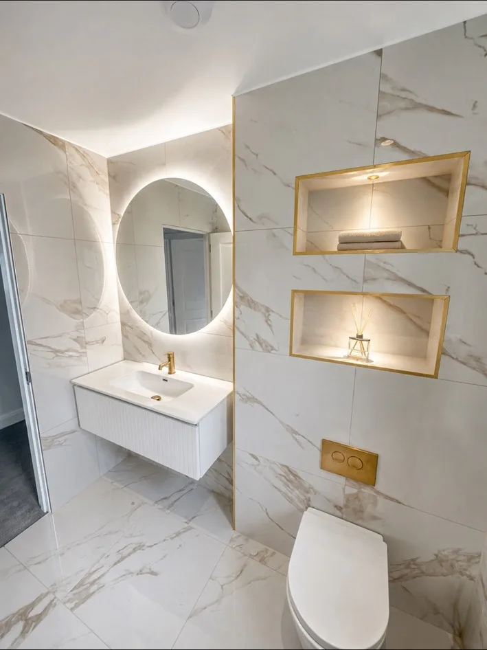 Illuminated bathroom niches completed by Oakside Joinery