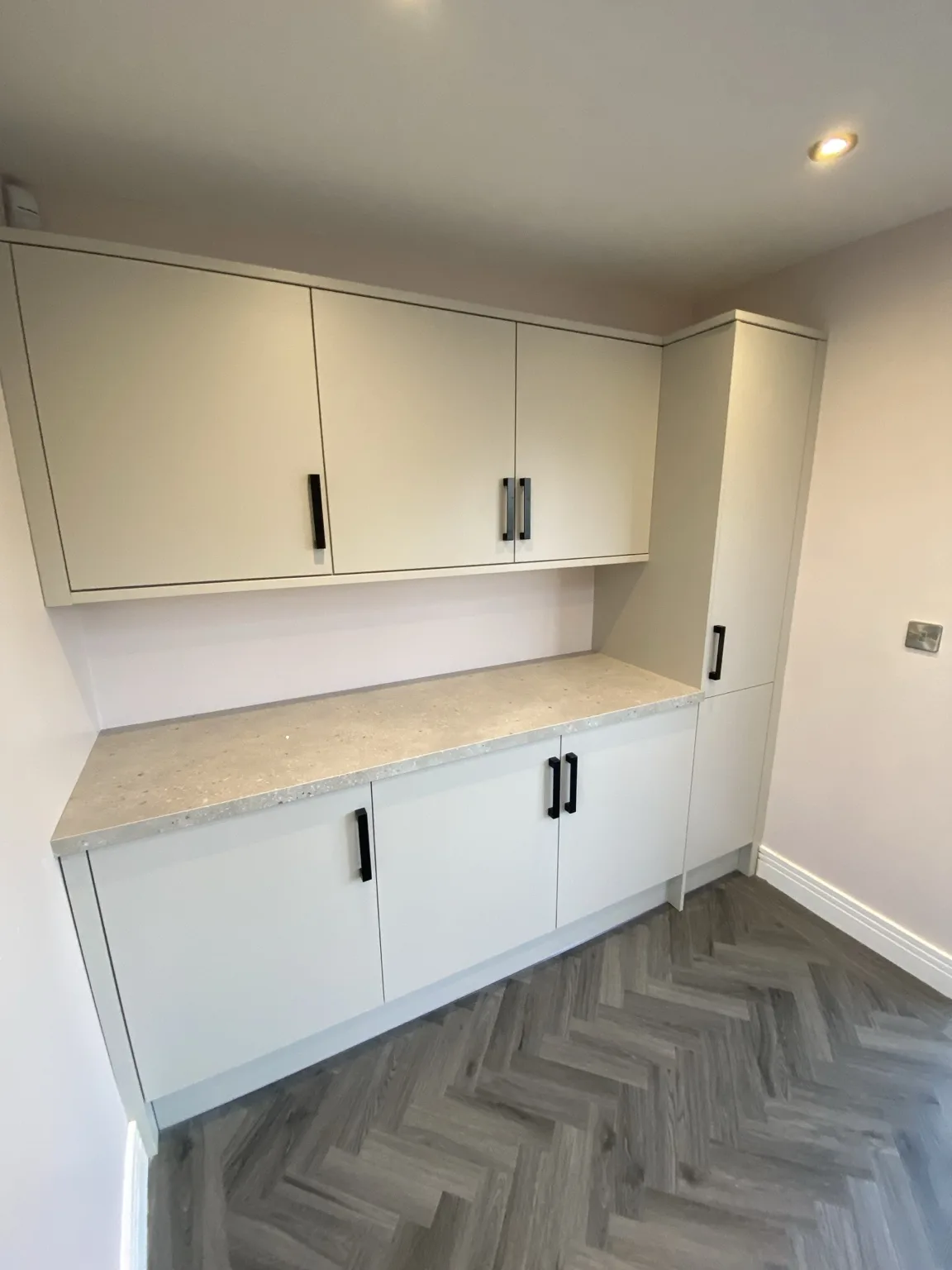 Fitted utility cabinetry completed by Oakside Joinery